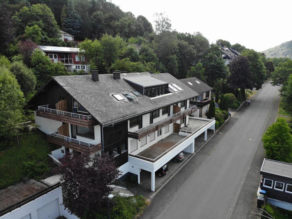 an aerial view of a house with a road at Ferienwohnung Südhang in Winterberg