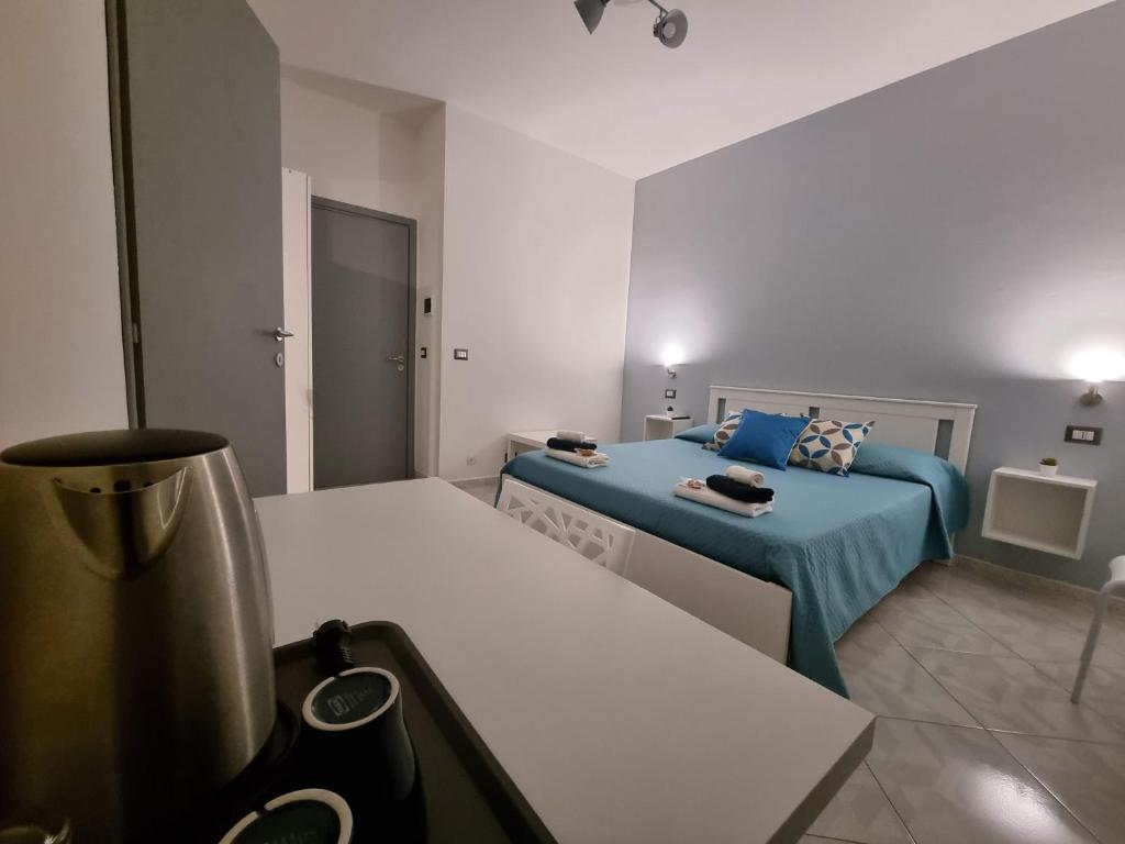 Postel nebo postele na pokoji v ubytování B&B TERRA DI MITI