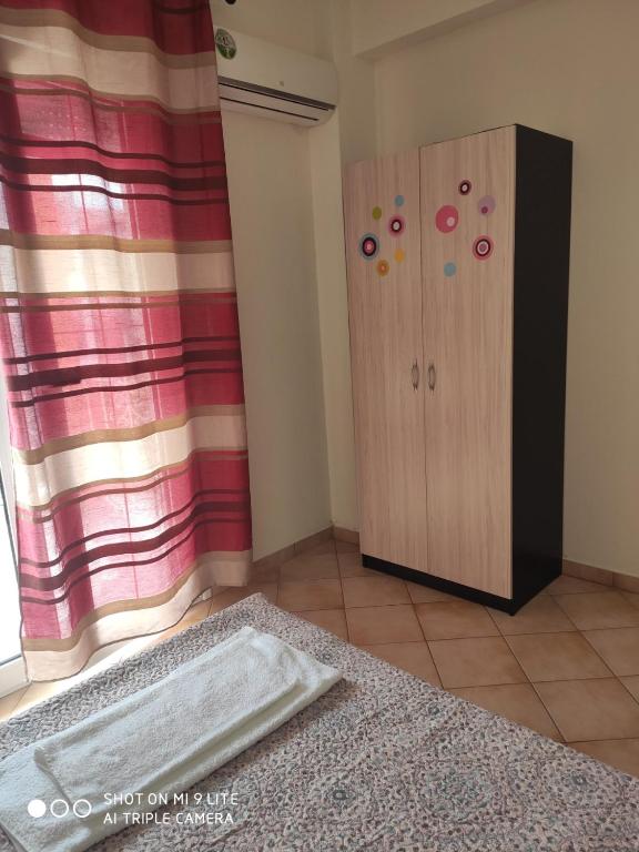 Postel nebo postele na pokoji v ubytování Kelesi Apartments
