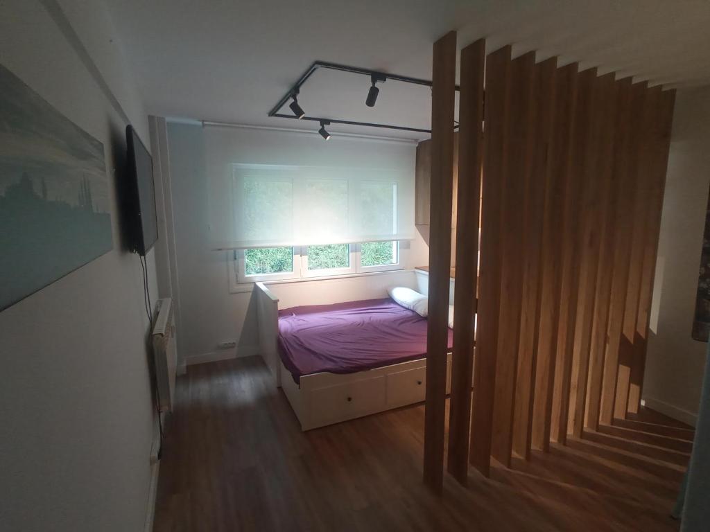 Postel nebo postele na pokoji v ubytování Precioso loft a 600m de la catedral