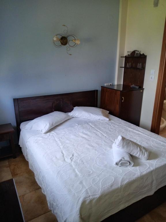 Postel nebo postele na pokoji v ubytování Hotel Erotas