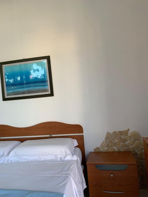 Postel nebo postele na pokoji v ubytování GiuMar
