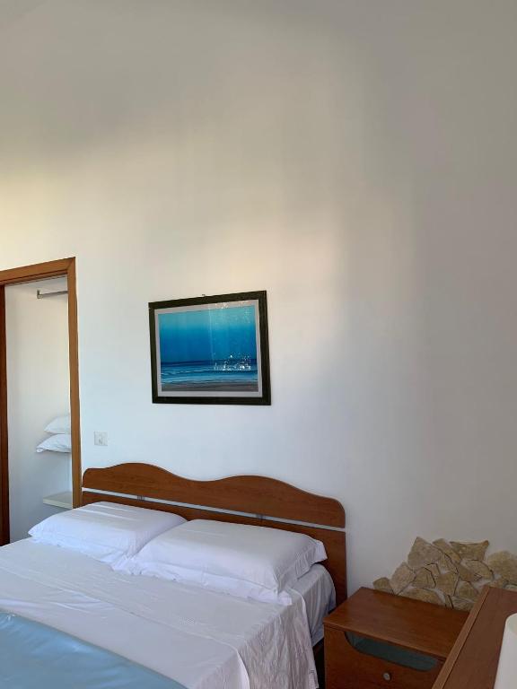 Postel nebo postele na pokoji v ubytování GiuMar