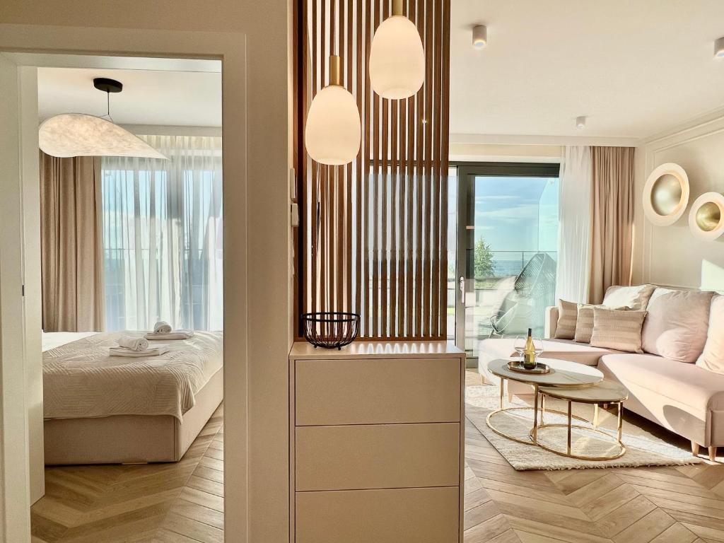 Giường trong phòng chung tại Baltic View REWAL 4-pax MOKKA