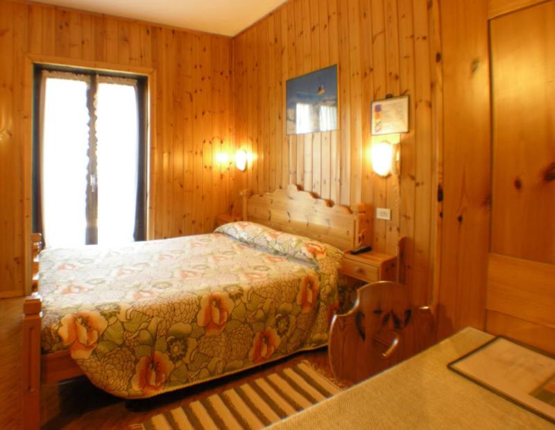 Postel nebo postele na pokoji v ubytování Hotel Federia
