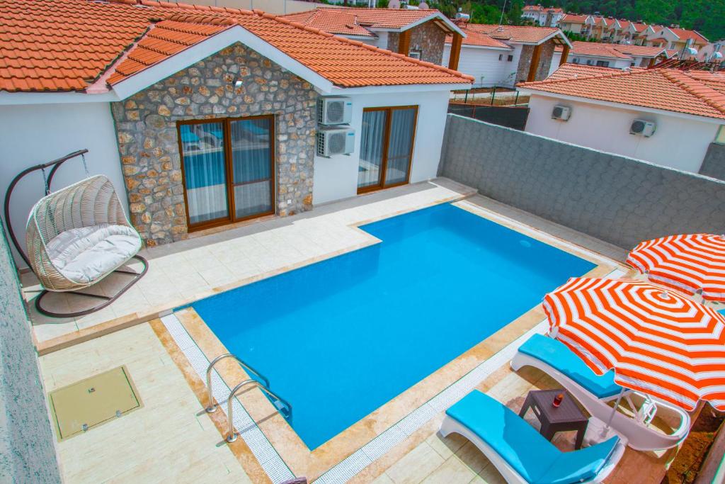 Bazén v ubytování Likya Suit A 2+1 Villa, Özel Havuzlu, Fethiye nebo v jeho okolí