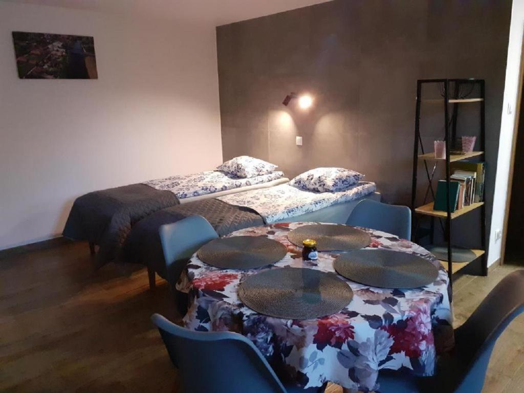 Posteľ alebo postele v izbe v ubytovaní Przystanek Tykocin - apartamenty gościnne