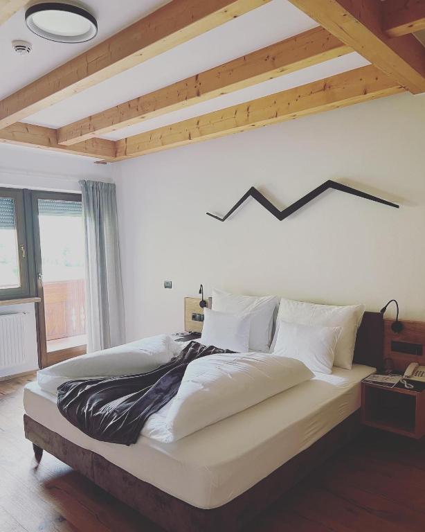 Postel nebo postele na pokoji v ubytování Hotel Lahnerhof