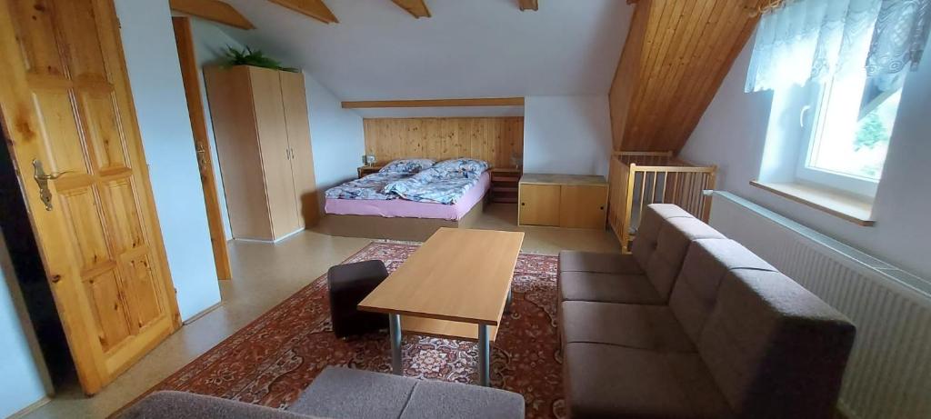 Postel nebo postele na pokoji v ubytování Ubytování Na Výsluní Tanvald