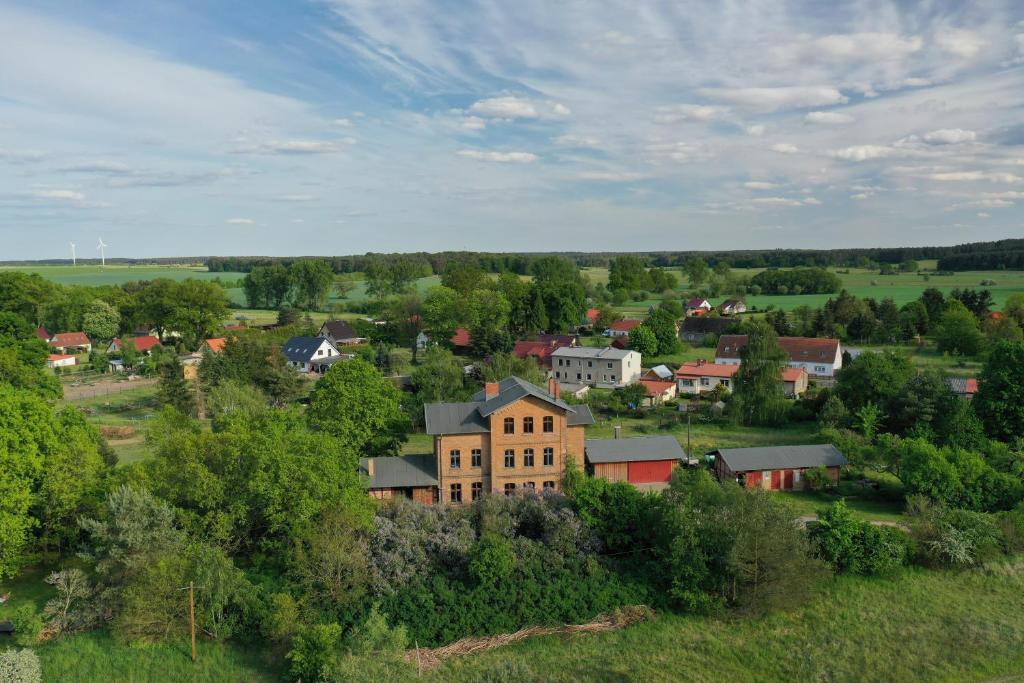an aerial view of a small town with a house at Landbahnhof Buschhof 1 Stock in Buschhof