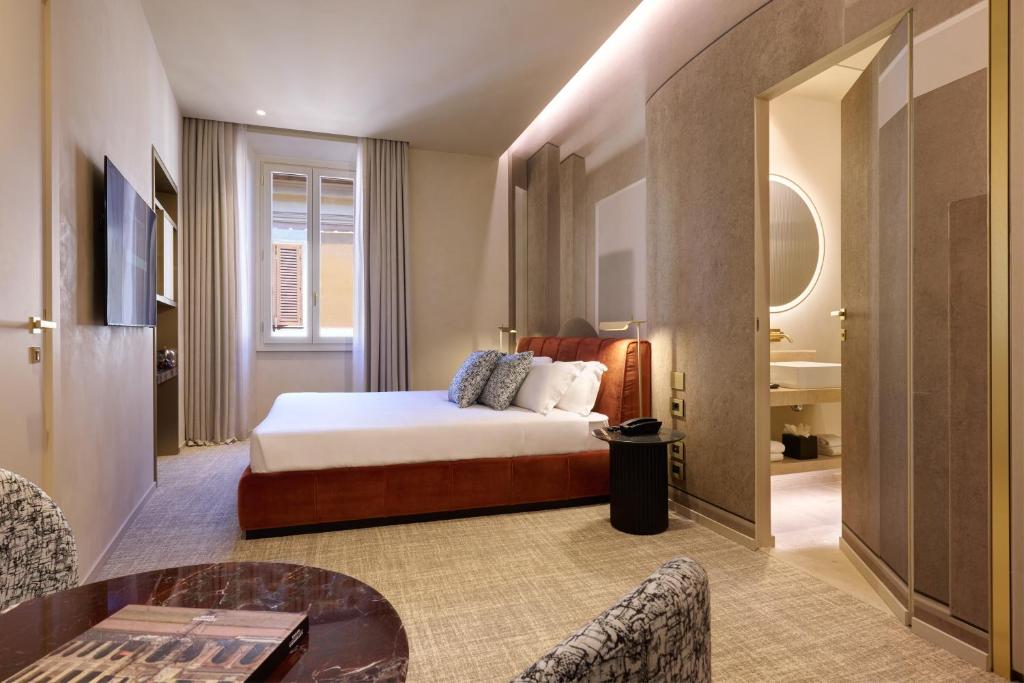 Letto o letti in una camera di Borghese Contemporary Hotel