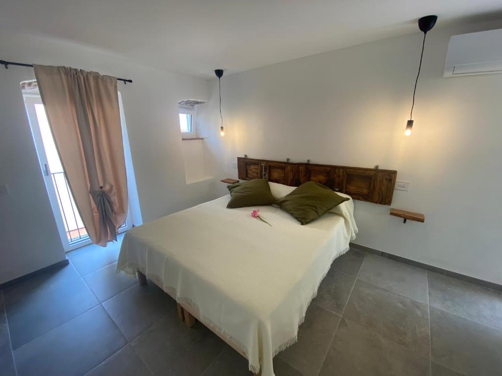 Postel nebo postele na pokoji v ubytování Relais PINF
