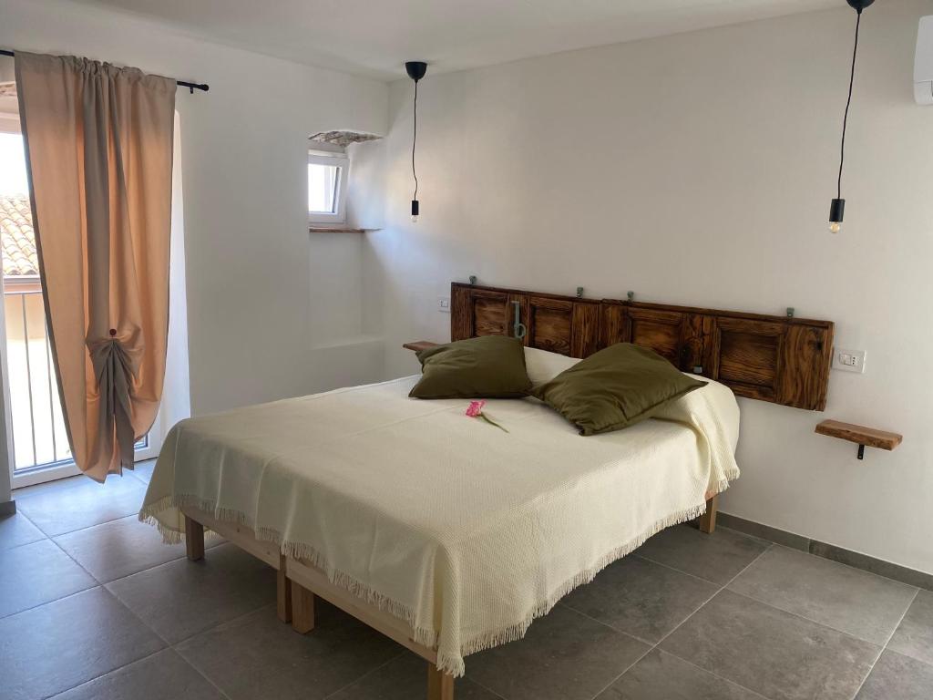 Postel nebo postele na pokoji v ubytování Relais PINF