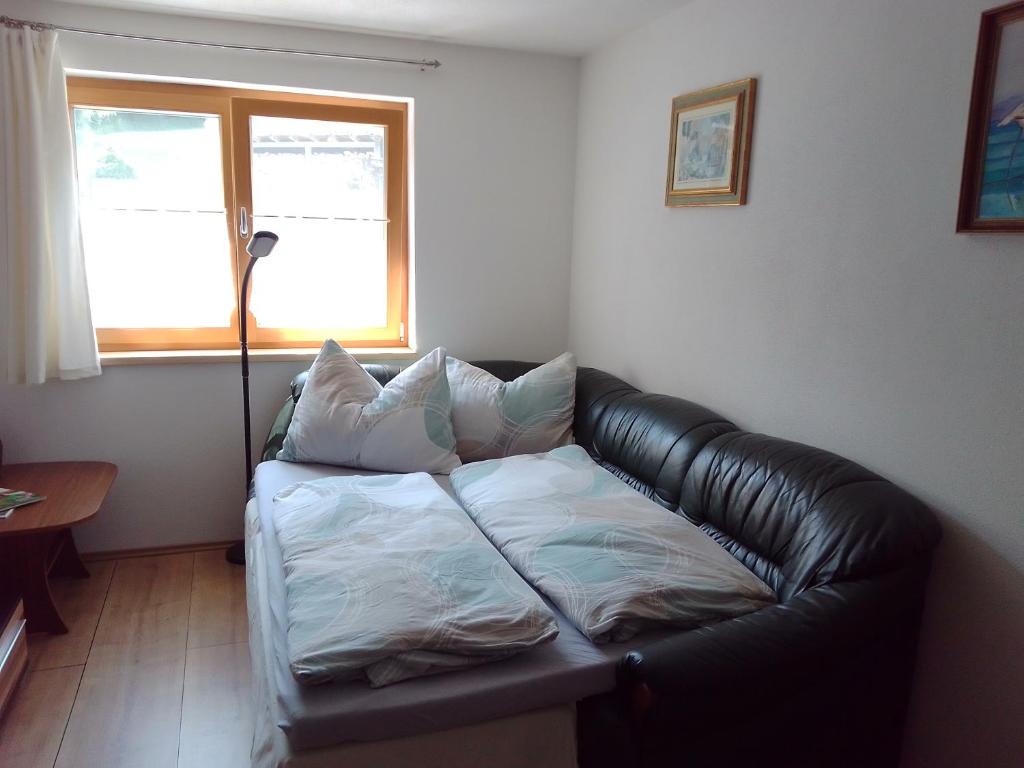 Postel nebo postele na pokoji v ubytování Ferienwohnung Maari
