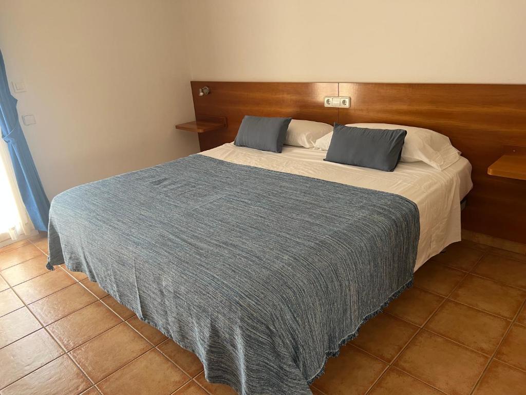 Postel nebo postele na pokoji v ubytování Vehí