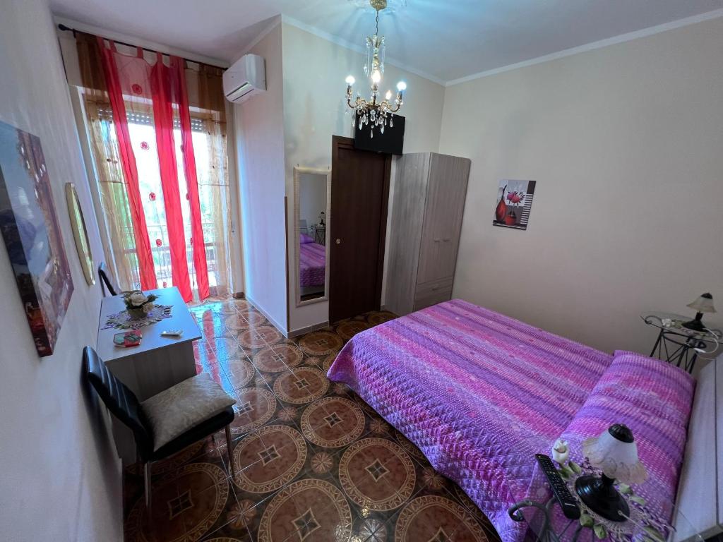 Postel nebo postele na pokoji v ubytování B&B EMPIRA Lamezia Terme