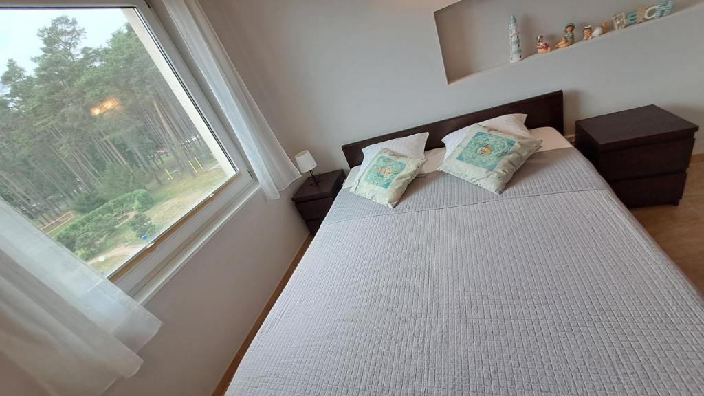 Postel nebo postele na pokoji v ubytování Komfortowy Apartament w Blue Mare
