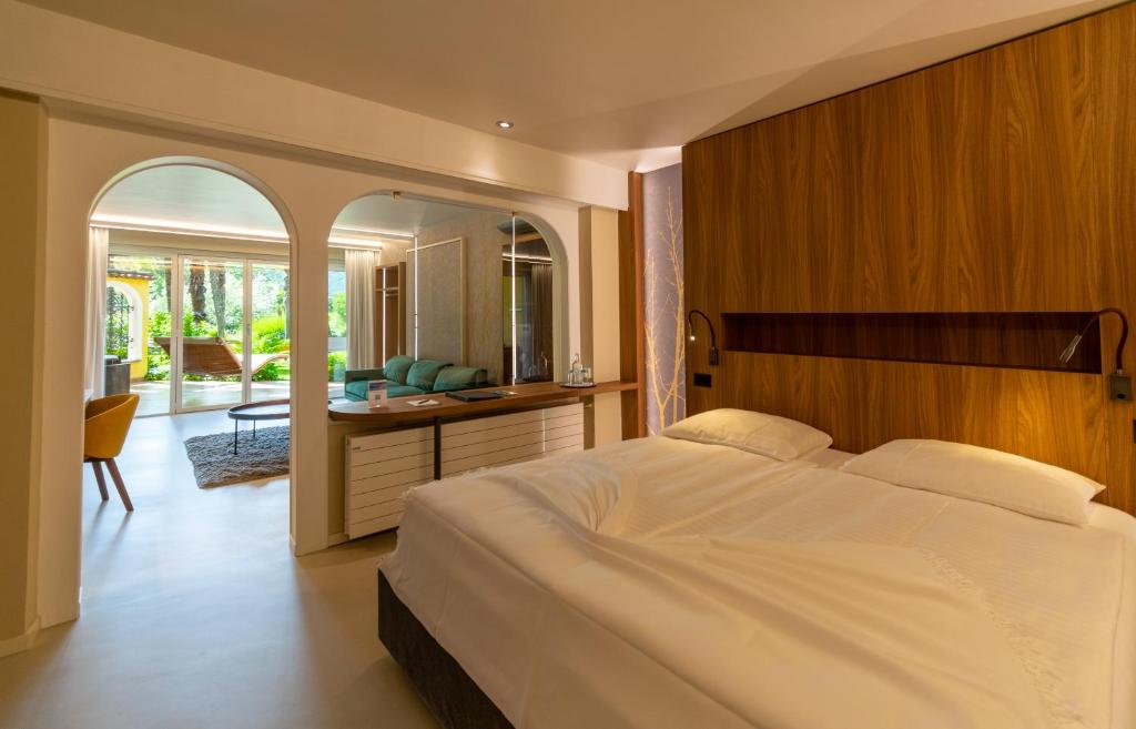 Postel nebo postele na pokoji v ubytování Albergo Losone