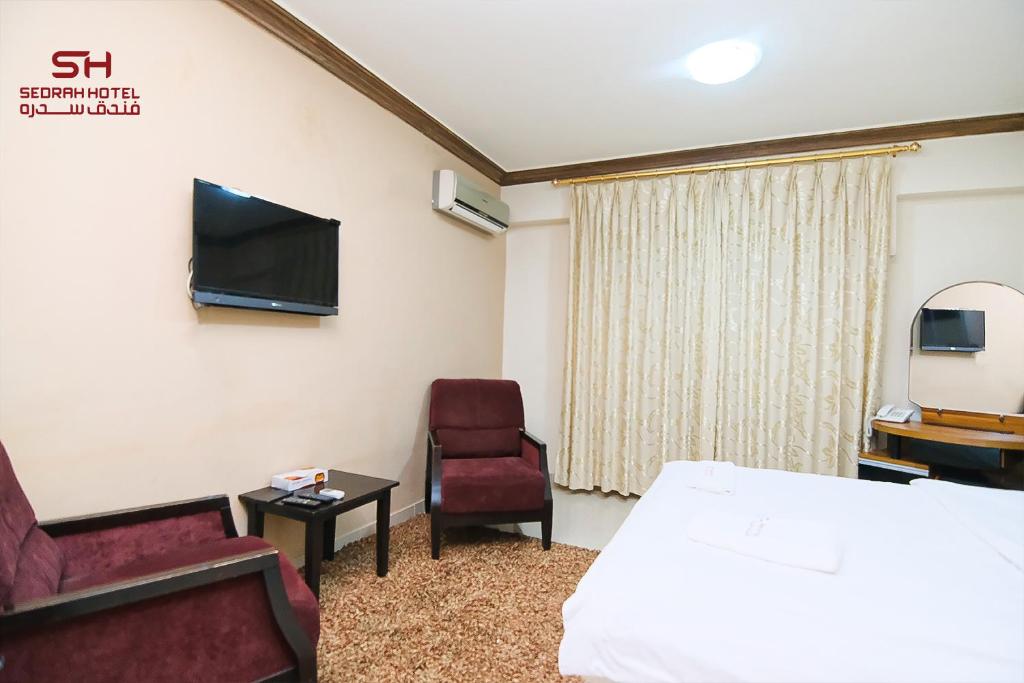 TV a/nebo společenská místnost v ubytování Sedrah Hotel