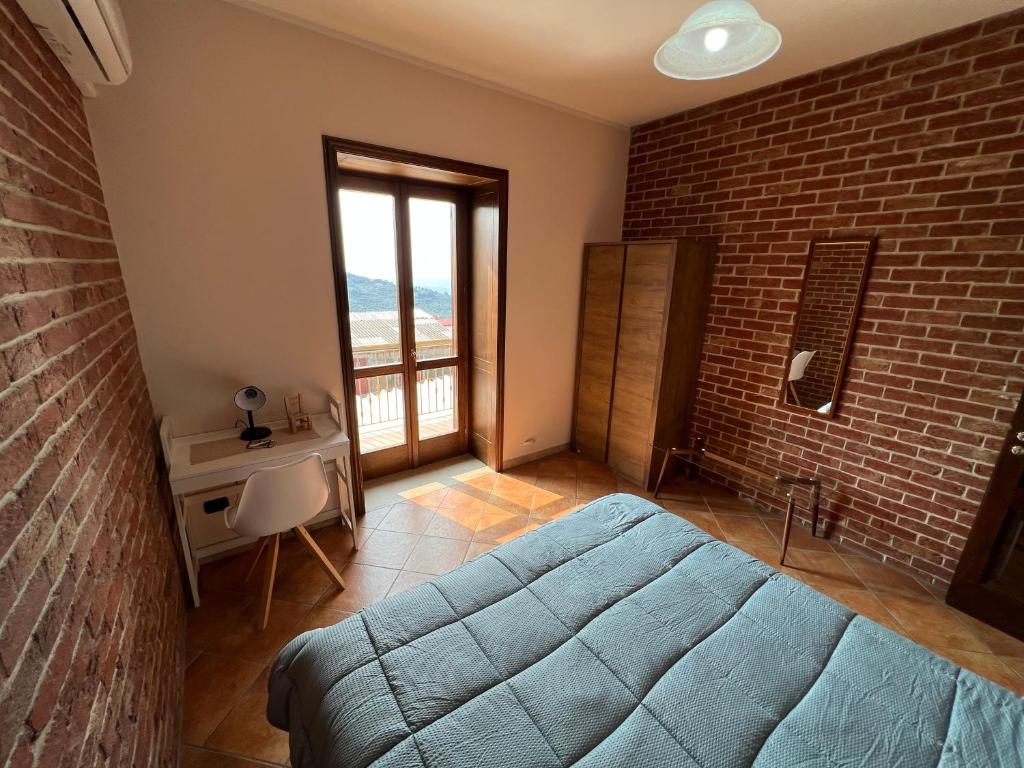 Postel nebo postele na pokoji v ubytování B&B EMPIRA Lamezia Terme