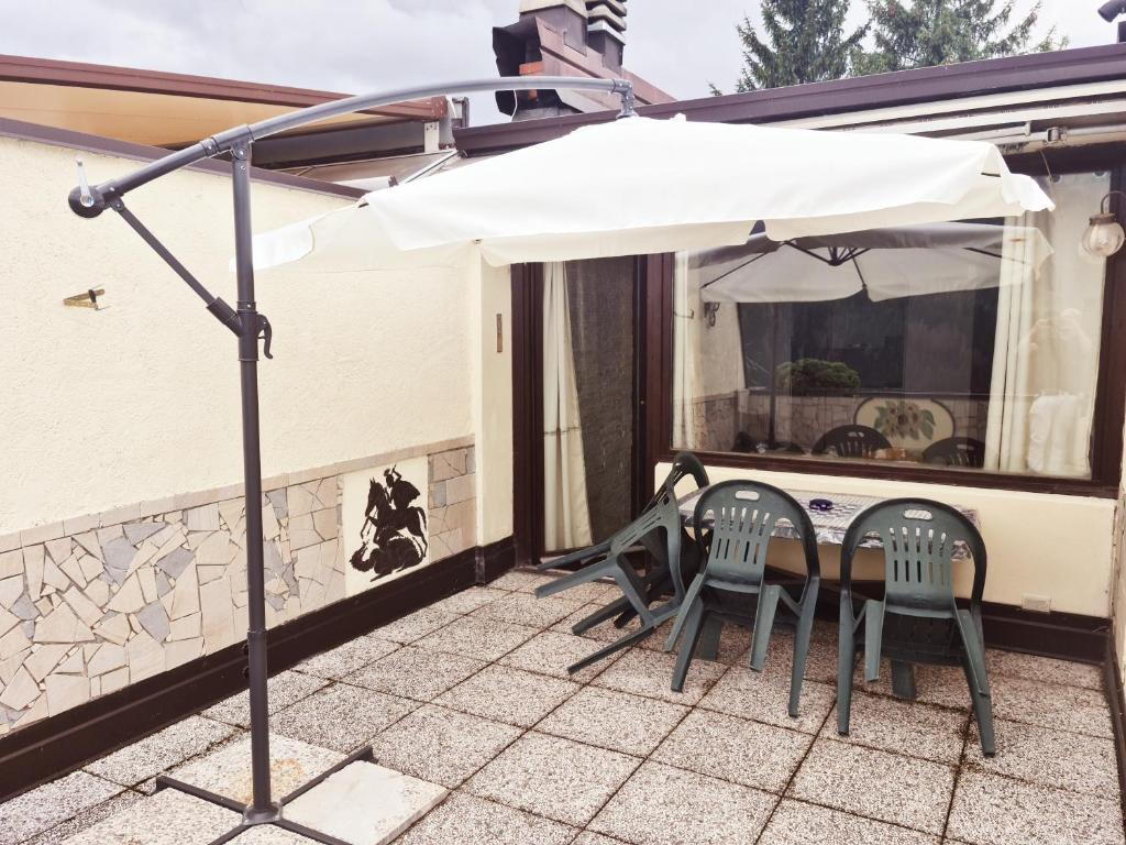 Balkón alebo terasa v ubytovaní TERRAZZA SULLE DOLOMITI