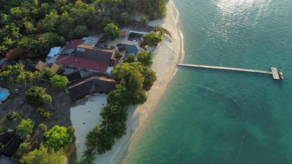 an aerial view of a house next to the water at Cruiser Island By Swiss-Belhotel in Ko Lone