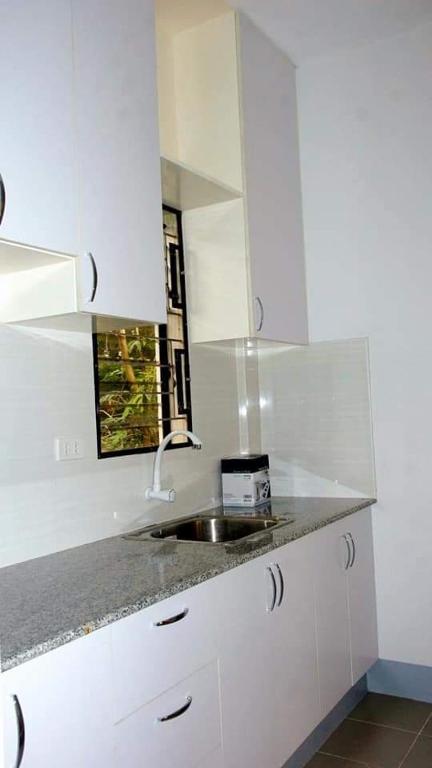 Kuchyň nebo kuchyňský kout v ubytování CAP Apartments