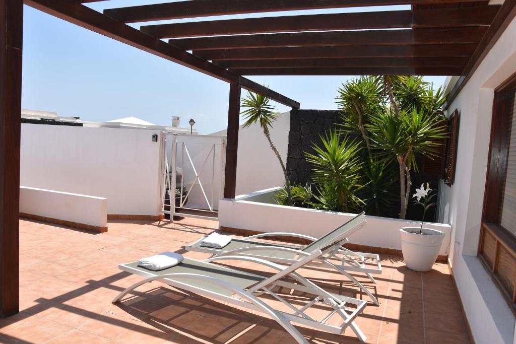 Balkón nebo terasa v ubytování Happy Villa con piscina privada