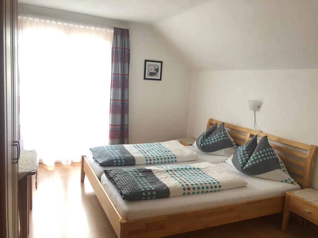 Postel nebo postele na pokoji v ubytování Lasserhof