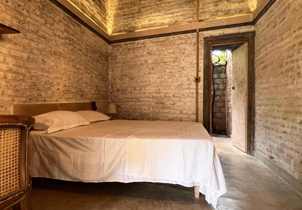 Postel nebo postele na pokoji v ubytování Nongu Home