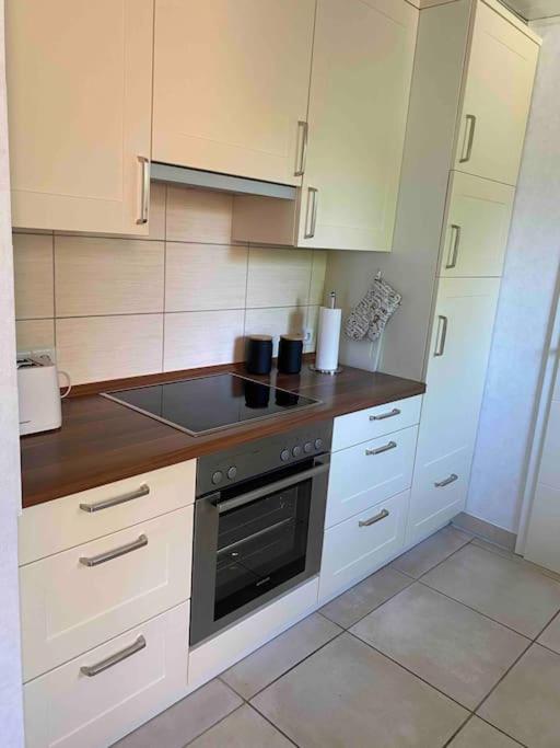 Kuchyň nebo kuchyňský kout v ubytování Ferienwohnung Bina