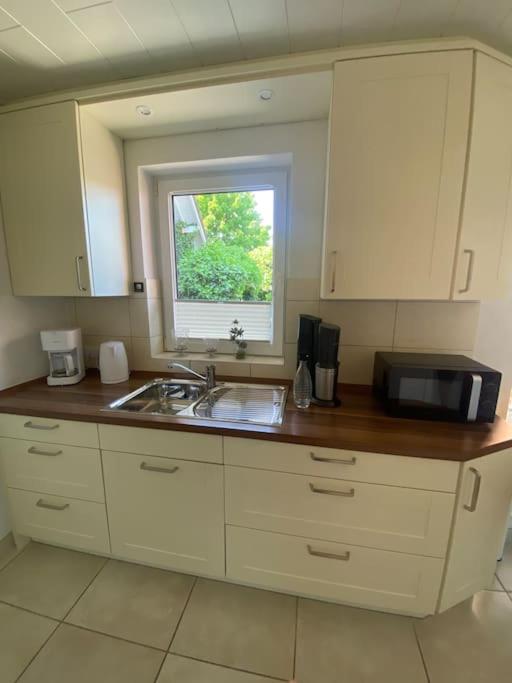 Kuchyň nebo kuchyňský kout v ubytování Ferienwohnung Bina