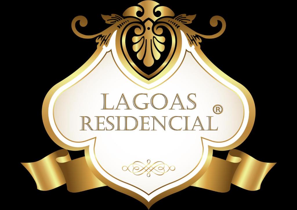 a gold and white label with a heart and the words lagosresresustainable at Lagoas in Tavira