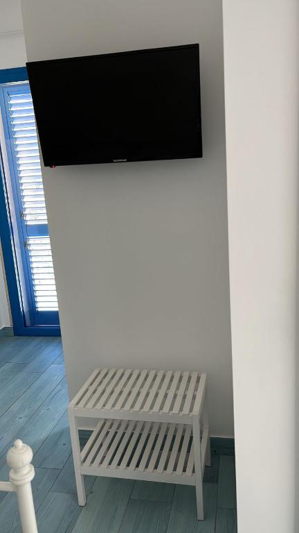 TV a/nebo společenská místnost v ubytování TENUTA TAURIANUM PanoramicHouse e PanoramicB&B