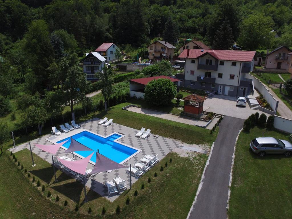 an aerial view of a house with a swimming pool at Vila Dzenana Boracko Jezero in Konjic