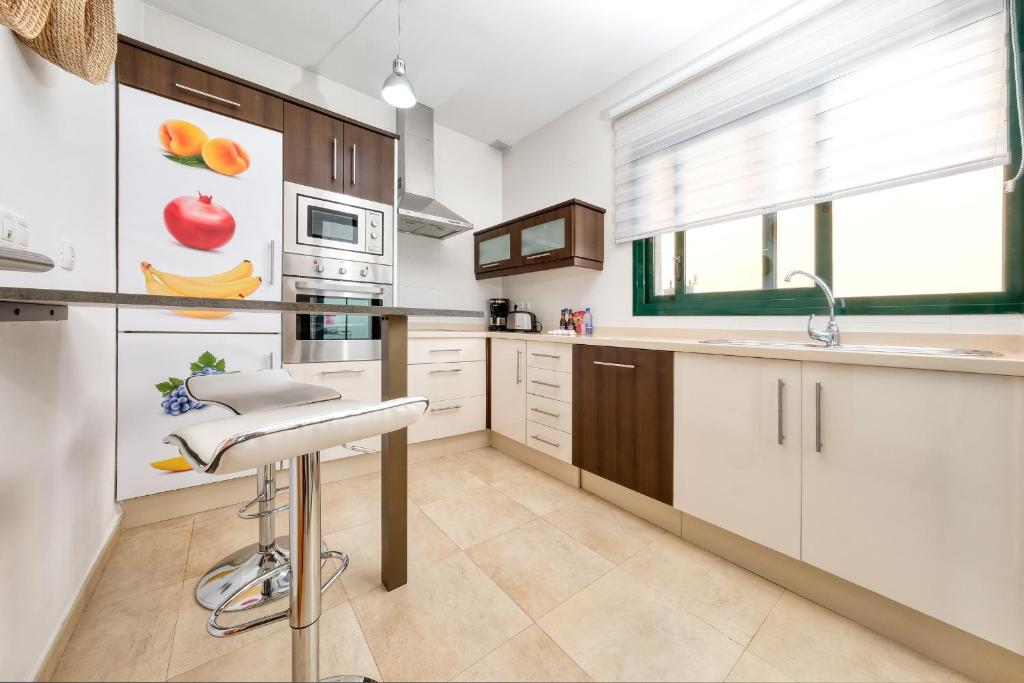 Kuchyň nebo kuchyňský kout v ubytování Casa Costa Esmeralda-shared pool