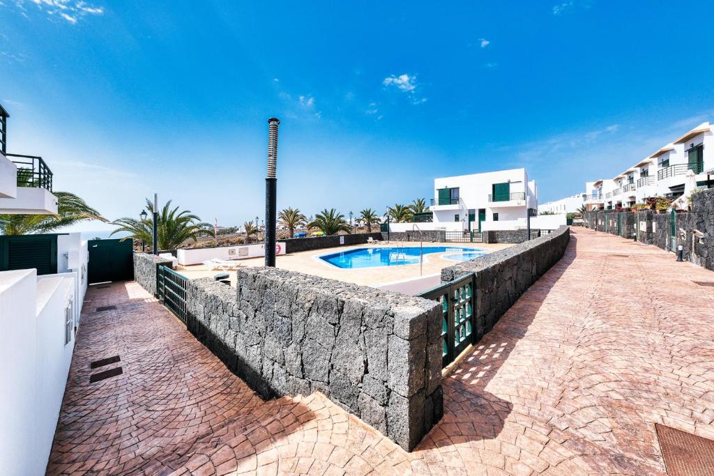 Bazén v ubytování Casa Costa Esmeralda-shared pool nebo v jeho okolí