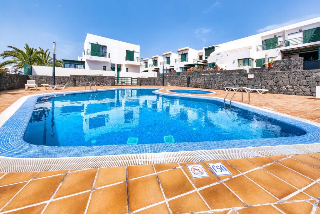 Bazén v ubytování Casa Costa Esmeralda-shared pool nebo v jeho okolí