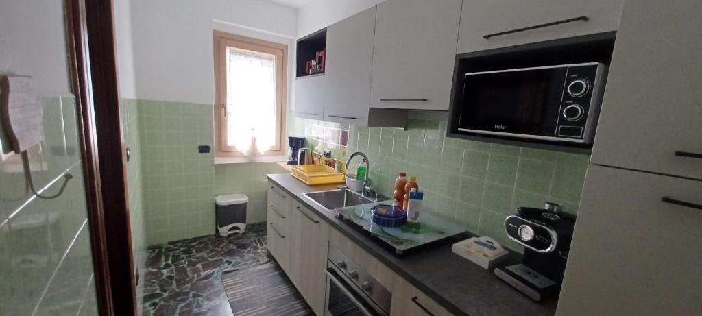 Kuchnia lub aneks kuchenny w obiekcie Retica Tirano