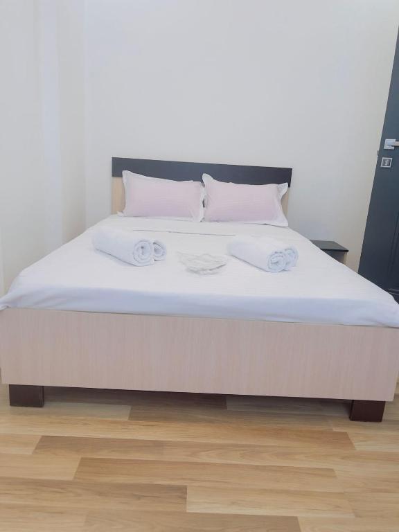 Postel nebo postele na pokoji v ubytování Maria House