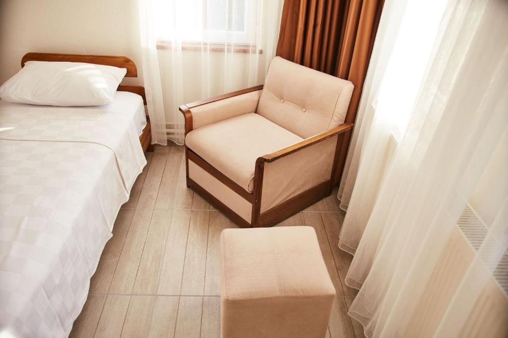 Postel nebo postele na pokoji v ubytování İlçayto Suites