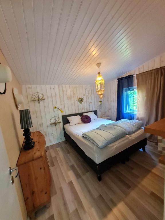 Postel nebo postele na pokoji v ubytování Lygnareds Camping