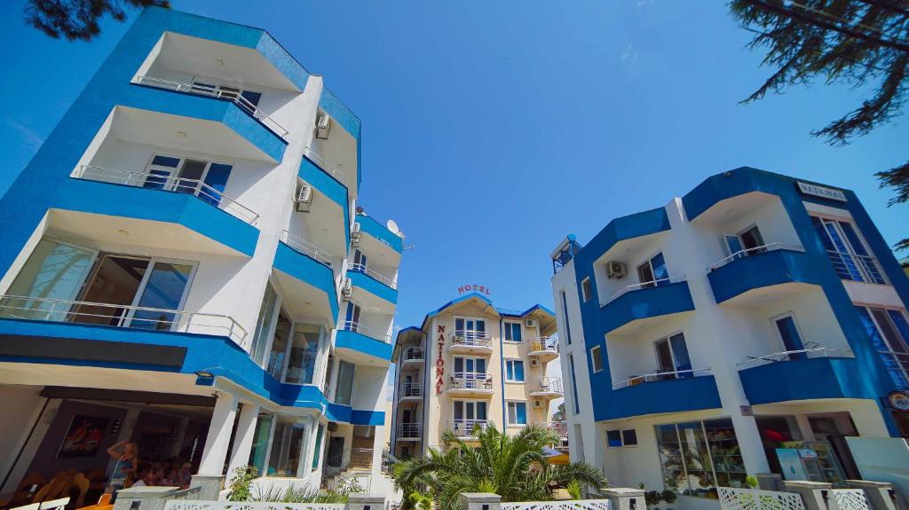 a group of buildings with blue and white at National+ in Ureki