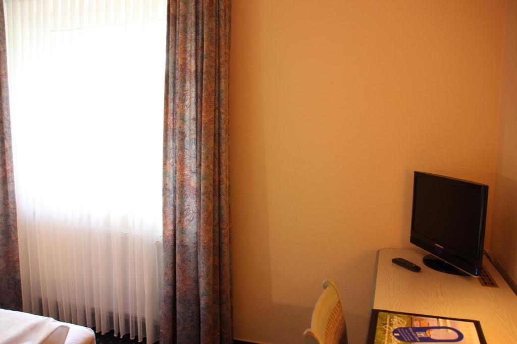 TV a/nebo společenská místnost v ubytování Hotel Nordic