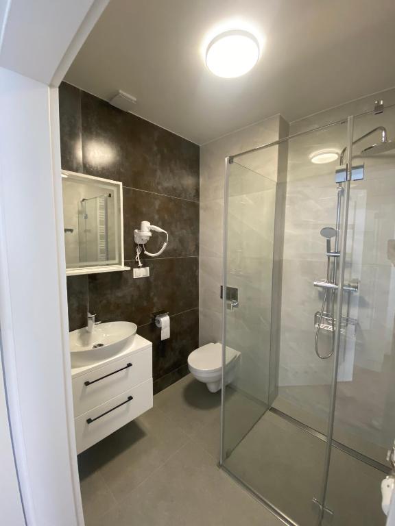 Koupelna v ubytování SOLEK Apartamenty i pokoje gościnne