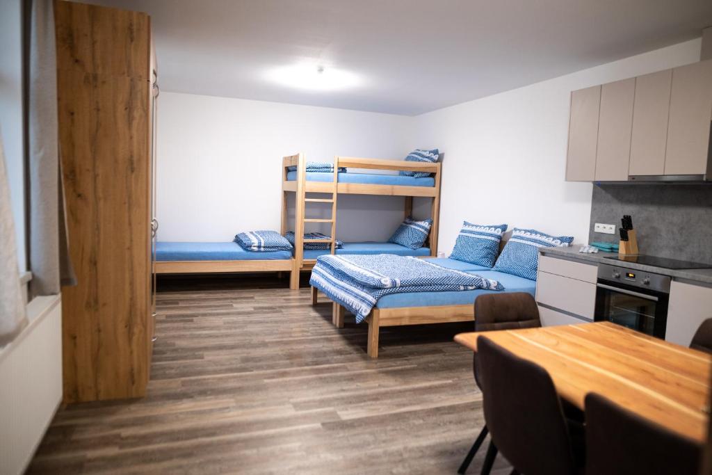 Postel nebo postele na pokoji v ubytování Penzion Na výminku