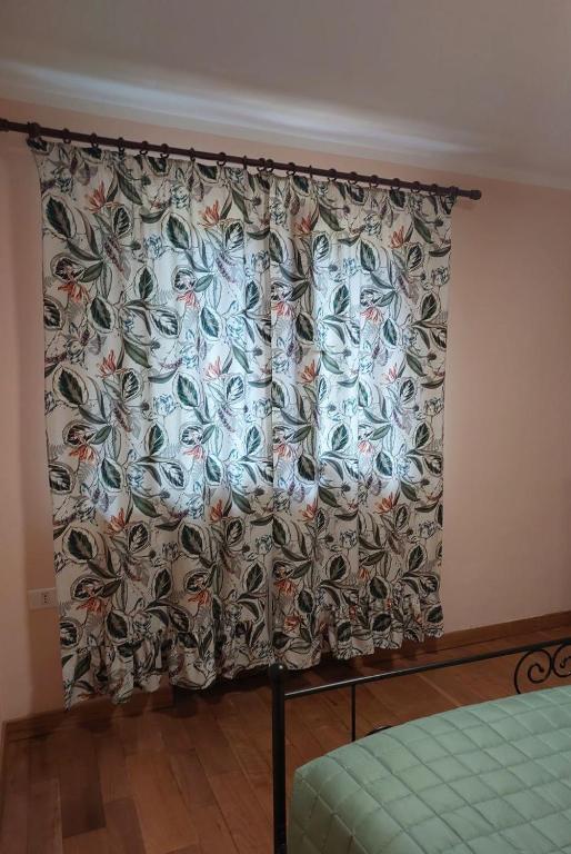 Postel nebo postele na pokoji v ubytování Nido Romantico
