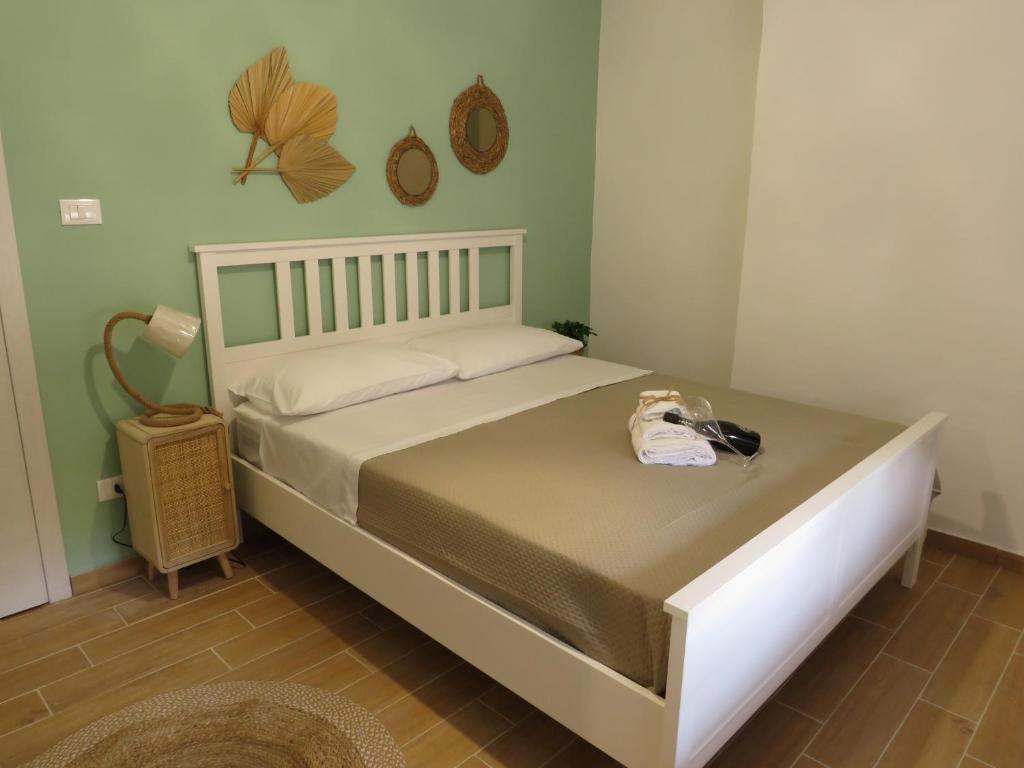 Postel nebo postele na pokoji v ubytování Tanufé Casa Vacanze