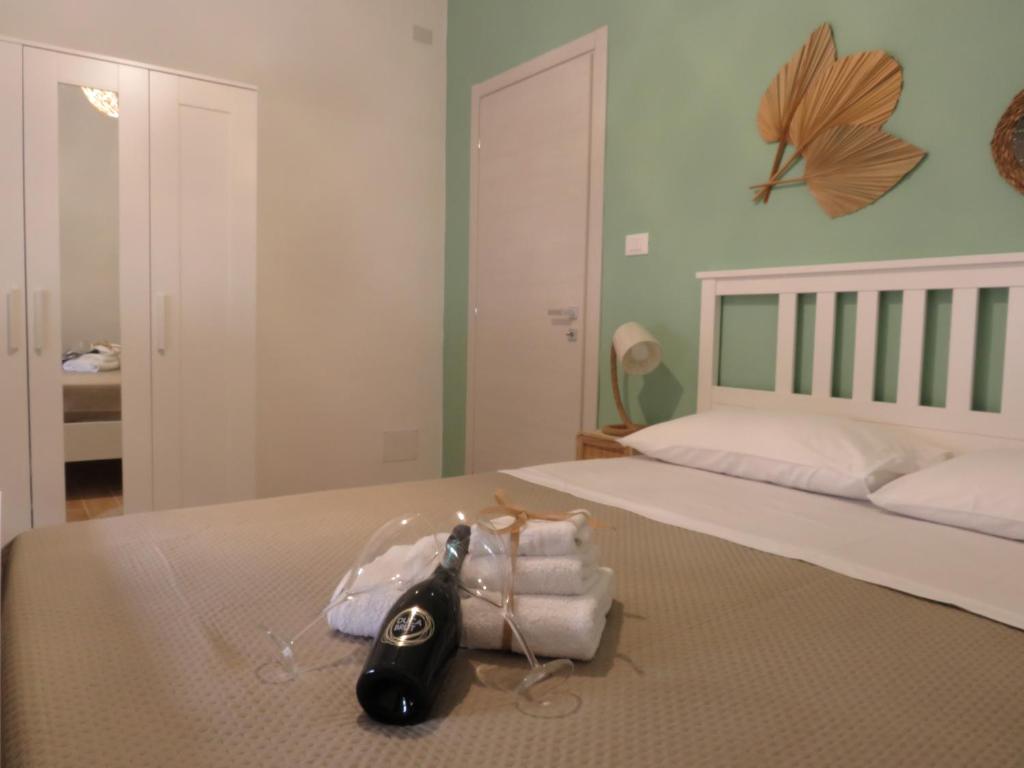 Postel nebo postele na pokoji v ubytování Tanufé Casa Vacanze