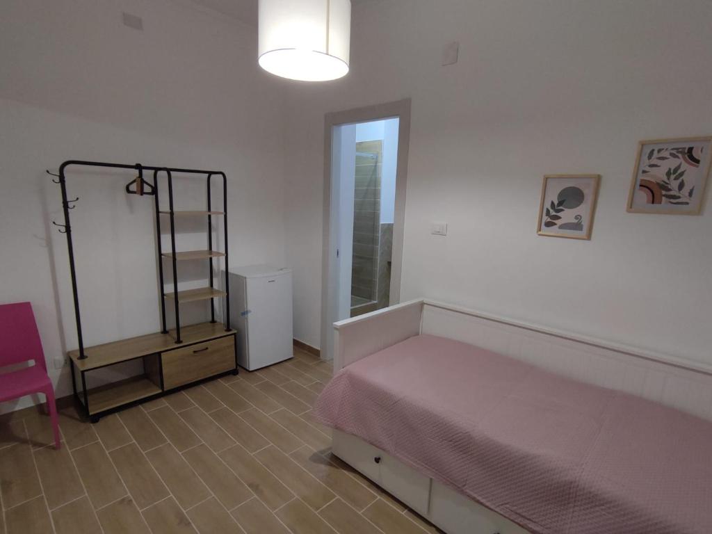 Postel nebo postele na pokoji v ubytování Tanufé Casa Vacanze